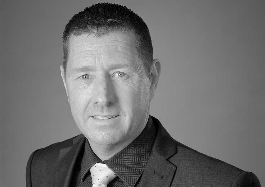 black and white picture of huddersfield bid director vernon.